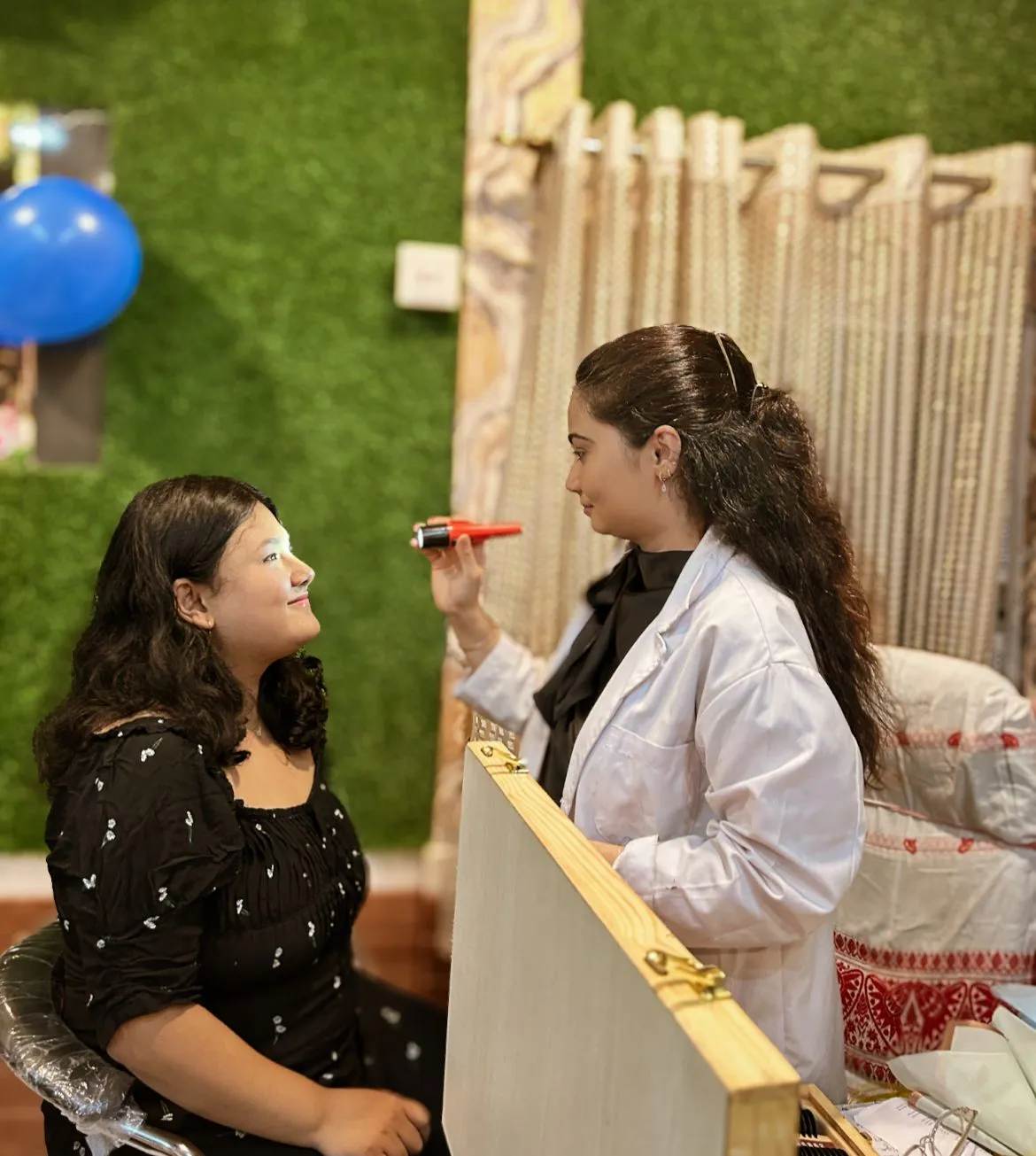 Optometrist with patient